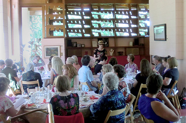 Mother's Day Tea at the Gordon House, Silverton, Oregon.  Susan Patterson, standing at the front, reading her poetry.